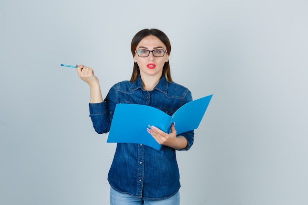 Expressive young woman posing