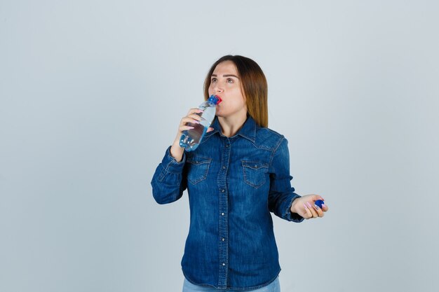 Expressive young woman posing