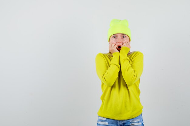 Expressive young woman posing