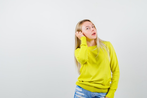 Expressive young woman posing