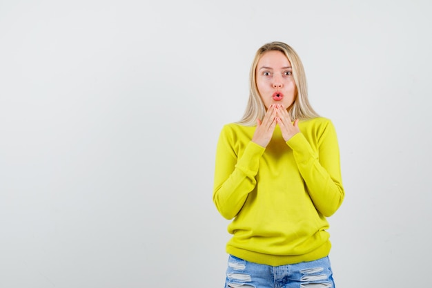 Expressive young woman posing