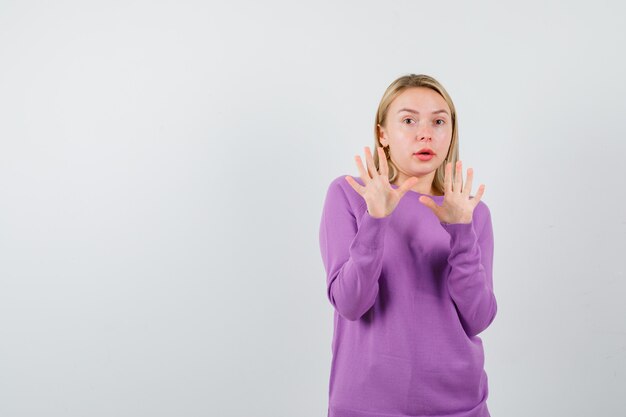 Expressive young woman posing