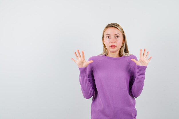 Expressive young woman posing