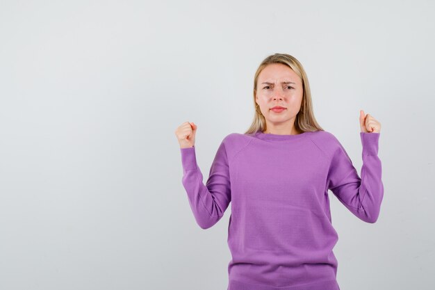 Expressive young woman posing