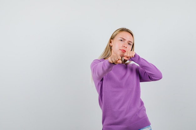 Expressive young woman posing