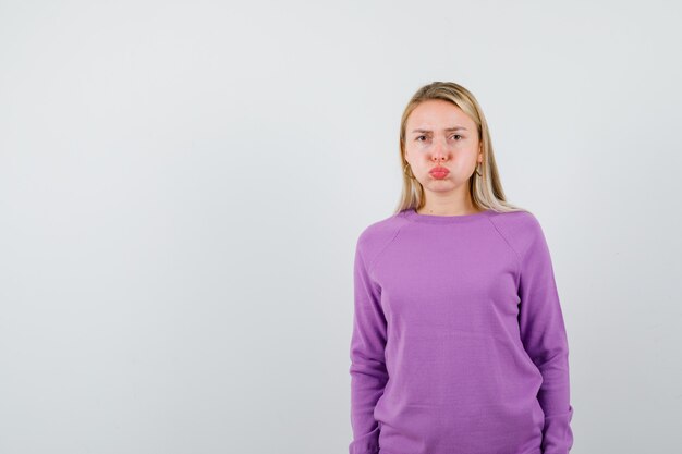 Expressive young woman posing