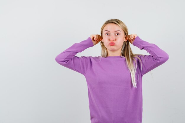 Expressive young woman posing