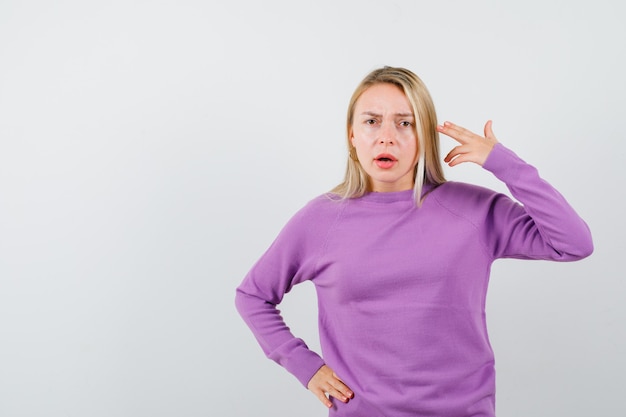 Expressive young woman posing