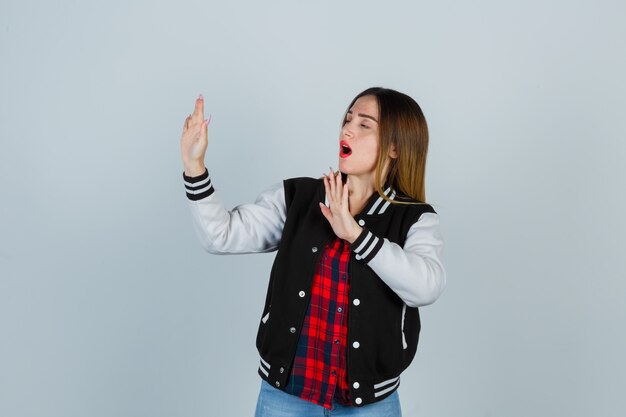 Expressive young woman posing