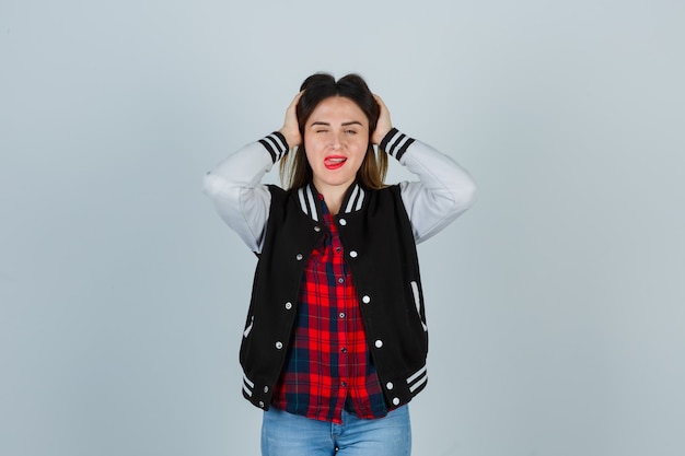 Free photo expressive young woman posing