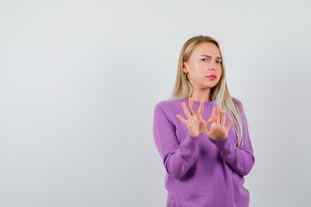 Expressive young woman posing