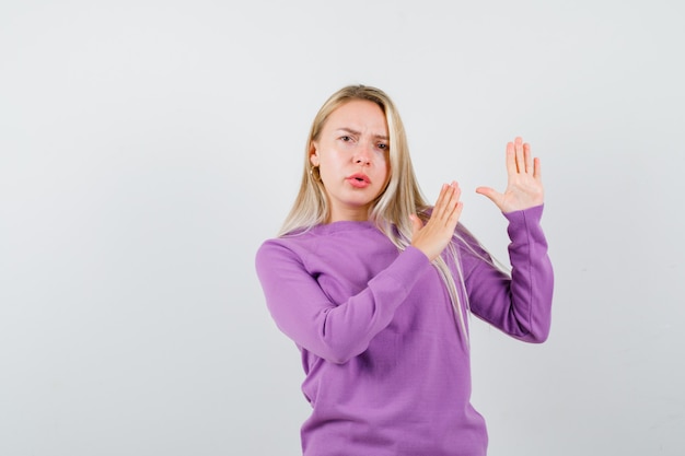 Expressive young woman posing