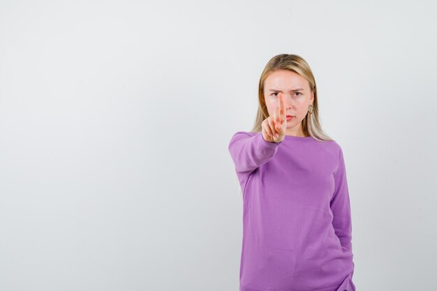 Expressive young woman posing