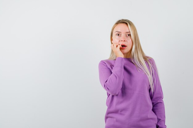 Expressive young woman posing