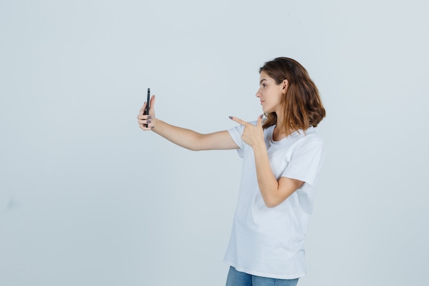 Expressive young woman posing