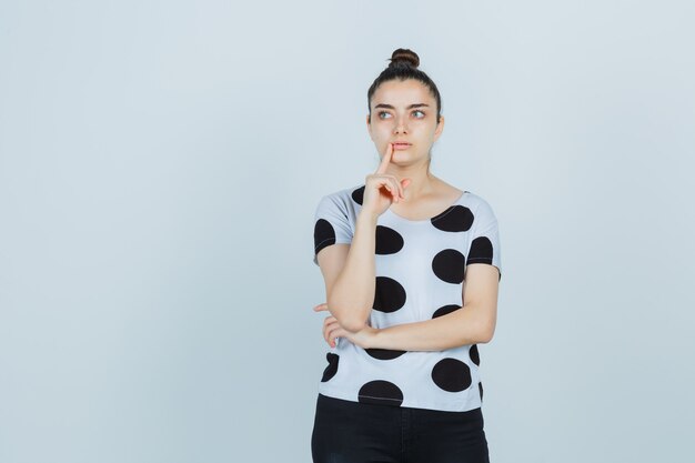 Expressive young woman posing