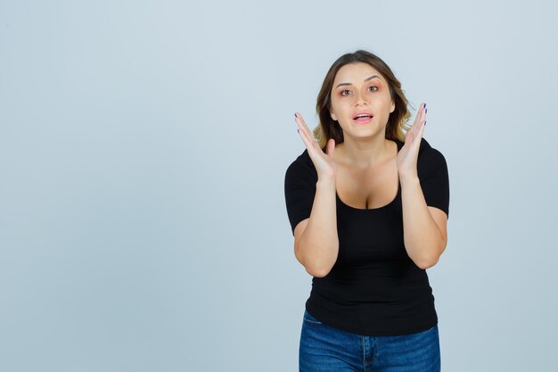 Expressive young woman posing