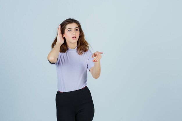 Expressive young woman posing