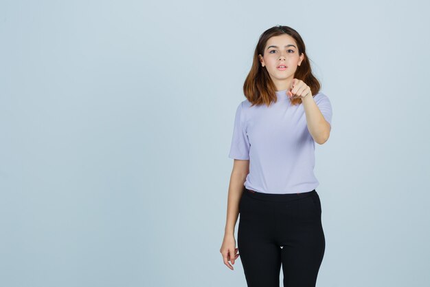 Expressive young woman posing