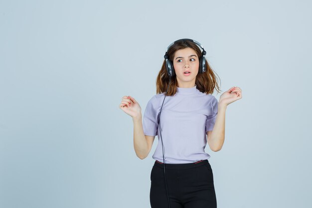 Expressive young woman posing