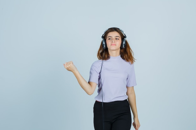 Expressive young woman posing