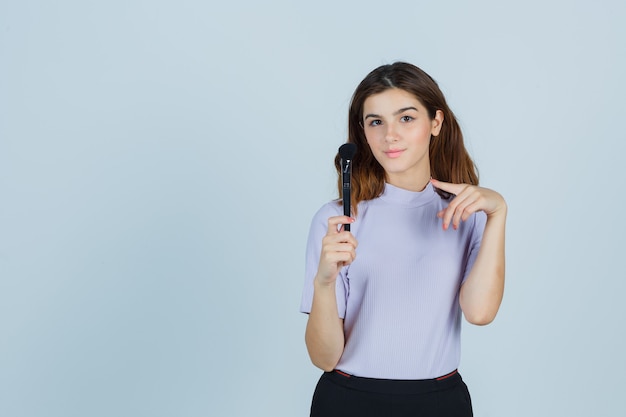 Expressive young woman posing