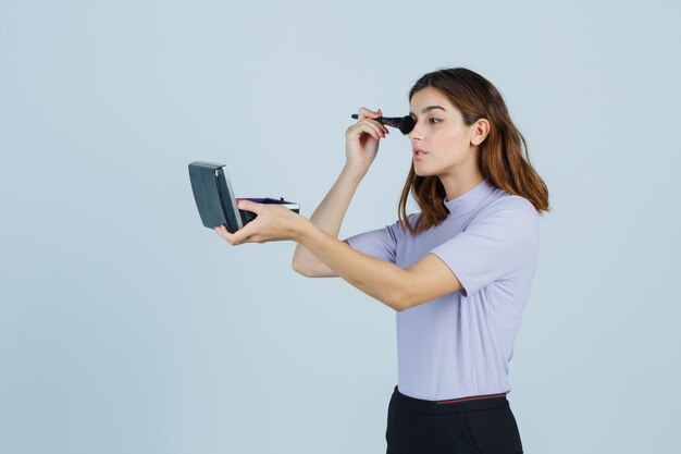 Expressive young woman posing