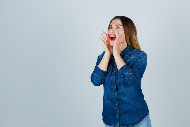 Expressive young woman posing