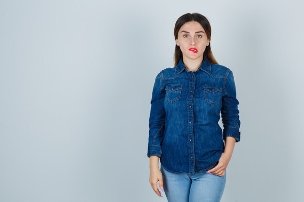 Expressive young woman posing