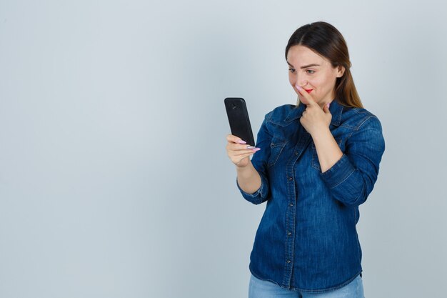 Expressive young woman posing