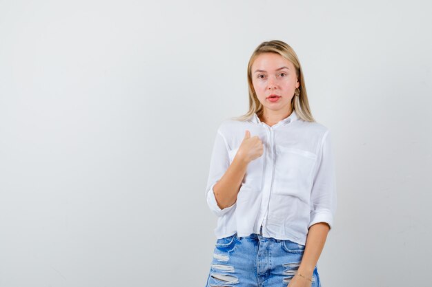 Expressive young woman posing