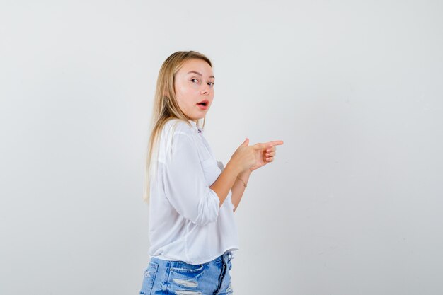 Expressive young woman posing