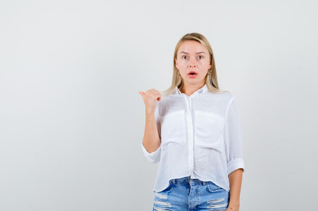 Expressive young woman posing