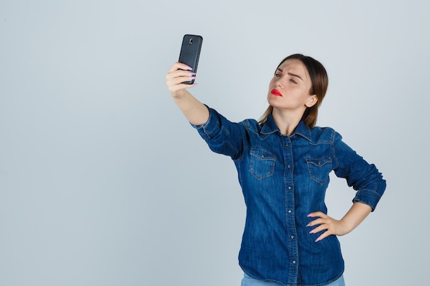 Expressive young woman posing