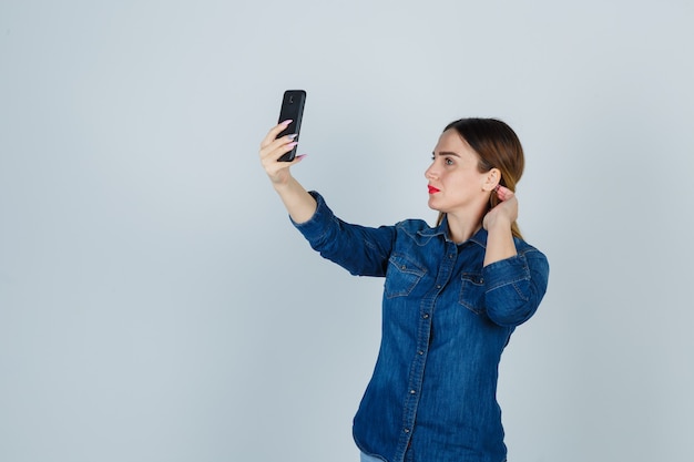 Expressive young woman posing