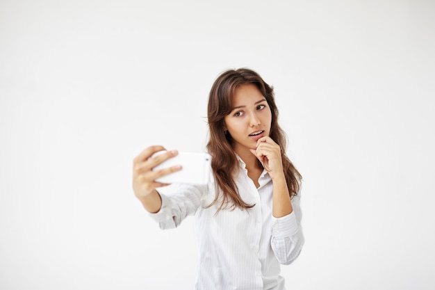 Expressive young woman posing