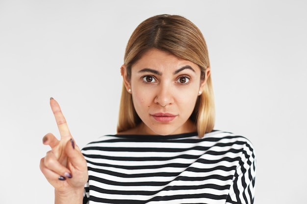 Free photo expressive young woman posing