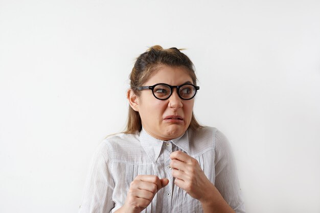 Expressive young woman posing