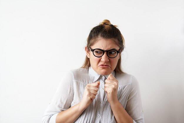 Expressive young woman posing