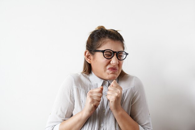 Expressive young woman posing