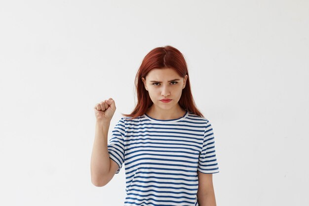 Expressive young woman posing