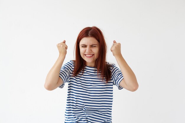 Expressive young woman posing