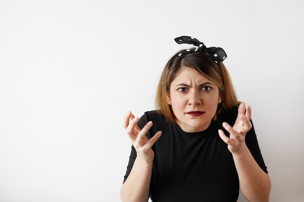 Expressive young woman posing