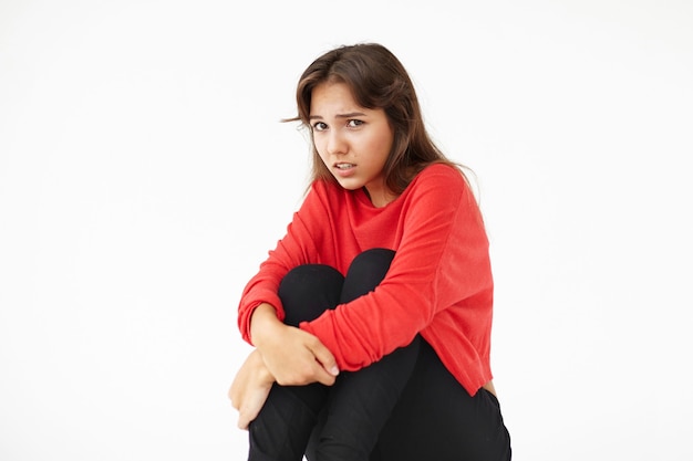 Expressive young woman posing