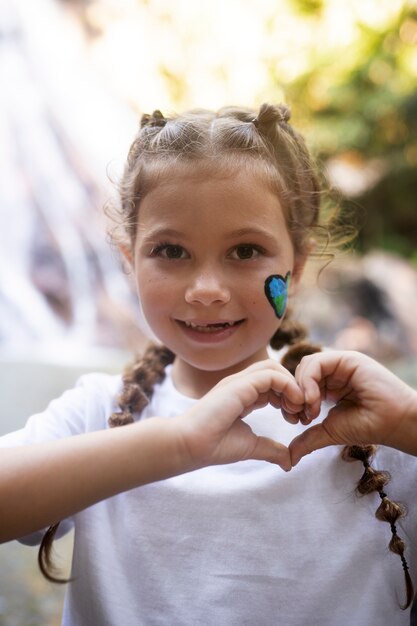 Exterior portrait of kid for world environment day