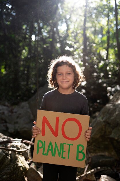 Exterior portrait of kid for world environment day