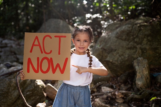 Exterior portrait of kid for world environment day