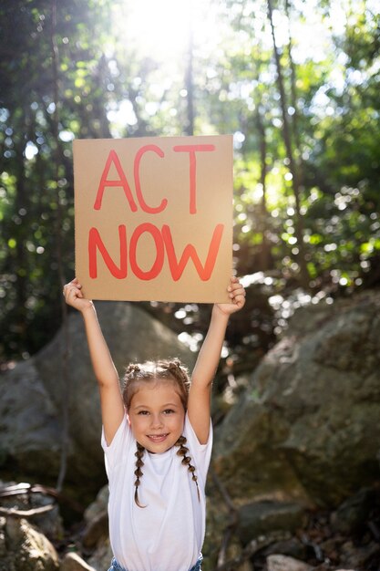 Exterior portrait of kid for world environment day