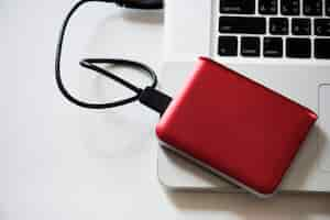 Free photo external hard disk drive connect to laptop