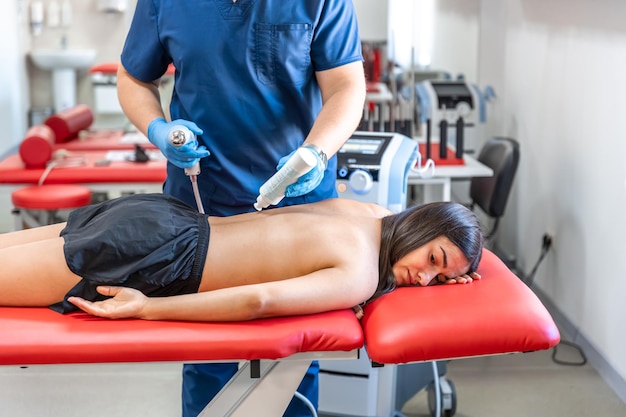 Free photo extracorporeal shockwave therapy physical therapy for neck and back muscles